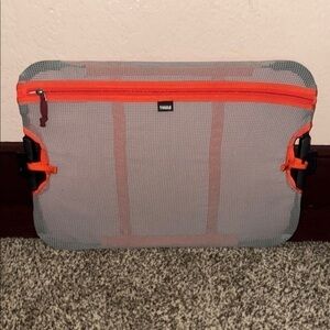Thule Gray and Orange Pocket for Thule Suit Case. Excellent used condition